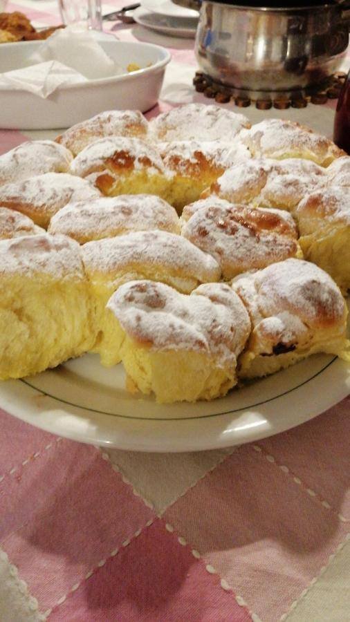 Homemade pastries with powdered sugar served at breakfast
